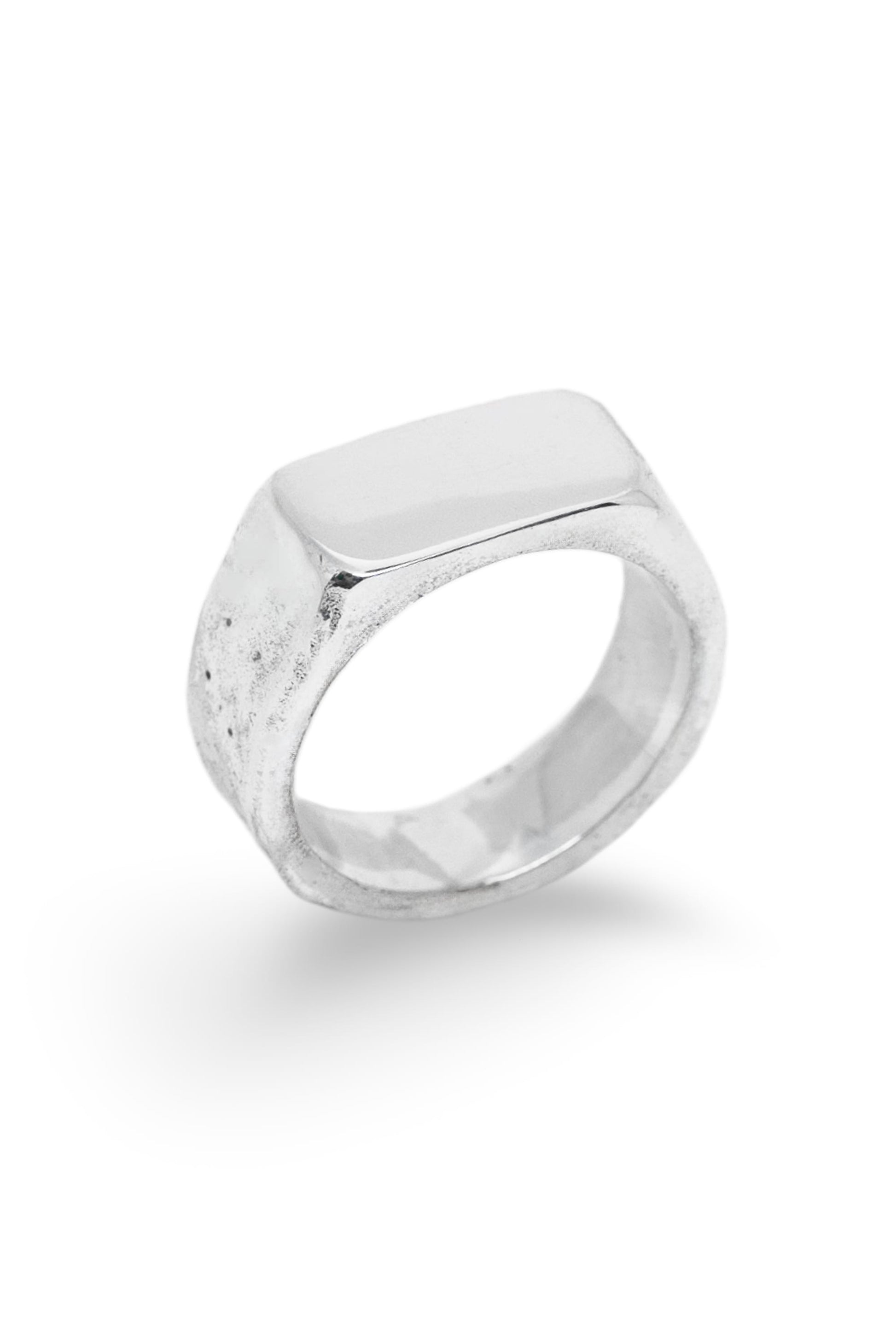 Recycled silver signet ring with a rectangular flat face and lightly textured band on a white background.